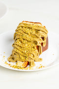 Viral Burnt Basque Cheesecake slice + Pistachio Sauce